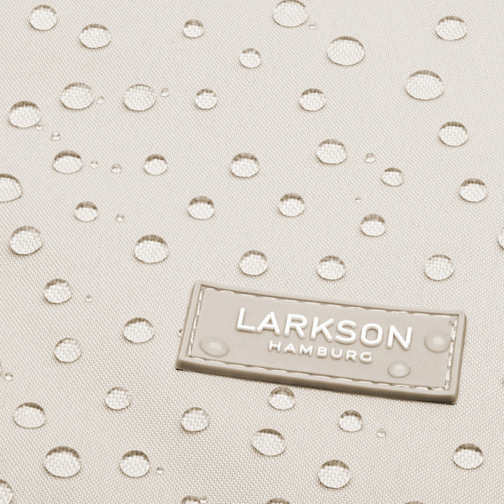 Beige wasserabweisender Stoff mit Wassertropfen und LARKSON HAMBURG Logo